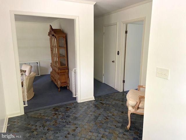 corridor featuring radiator and ornamental molding