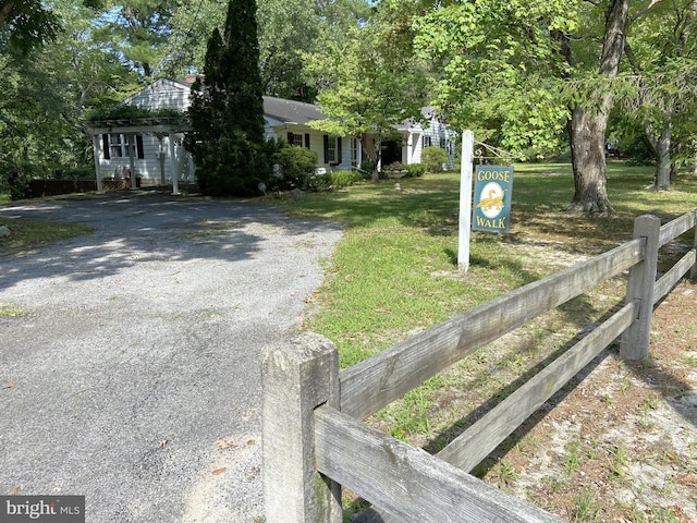 view of front of property with a front lawn