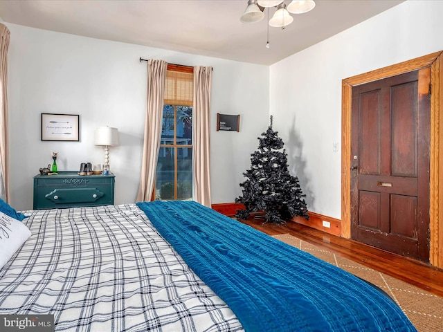 bedroom featuring hardwood / wood-style flooring