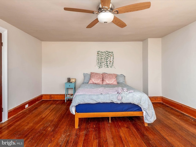 bedroom featuring ceiling fan and hardwood / wood-style flooring