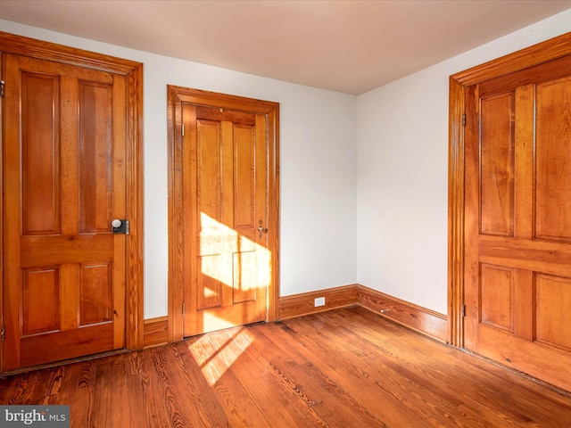 interior space with hardwood / wood-style flooring