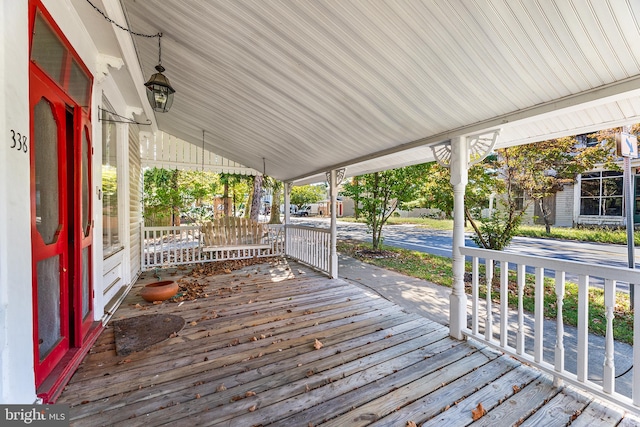 wooden deck with a porch