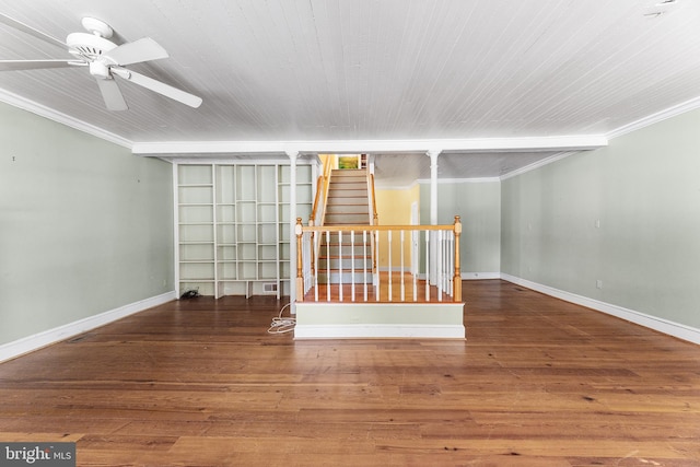 unfurnished room featuring crown molding, hardwood / wood-style floors, and ceiling fan