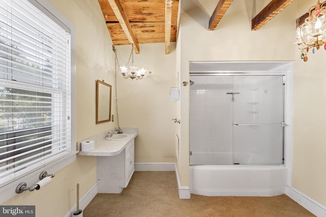 bathroom with beamed ceiling, vanity, wooden ceiling, and shower / bath combination with glass door