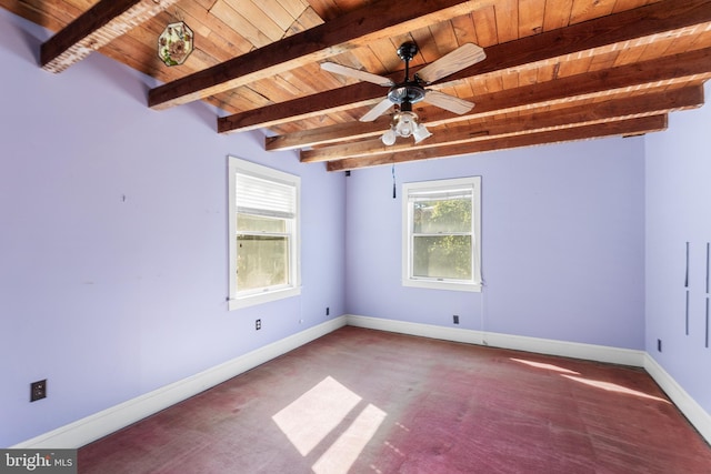 empty room featuring ceiling fan, carpet flooring, wooden ceiling, and beam ceiling