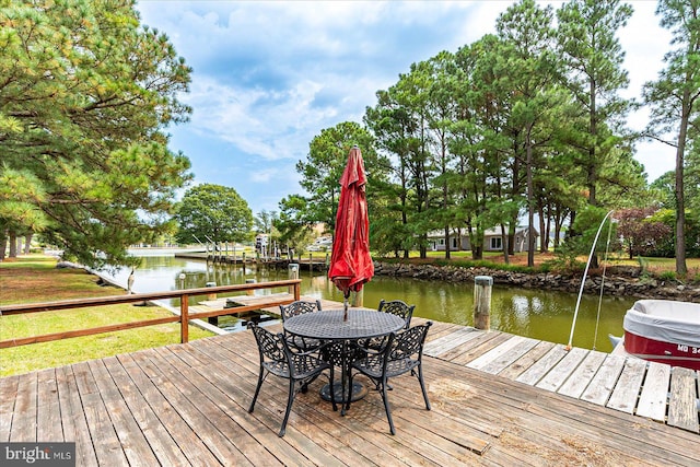 view of dock with a water view