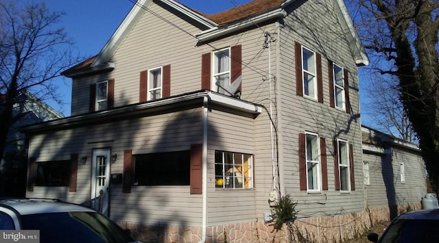 view of property exterior with a garage