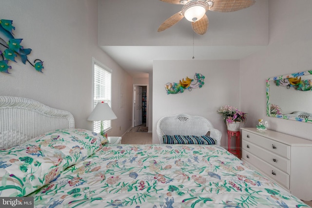 carpeted bedroom featuring ceiling fan