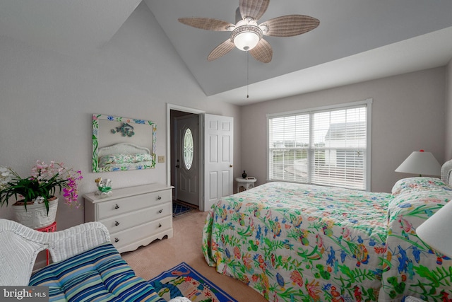 carpeted bedroom featuring ceiling fan and lofted ceiling