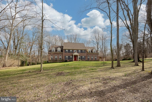 view of front of house with a front lawn