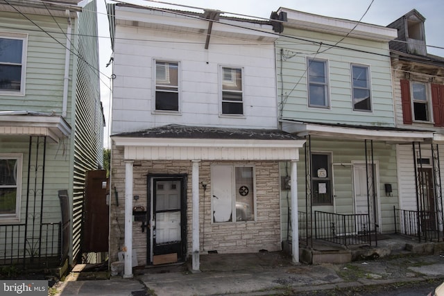 multi unit property featuring covered porch