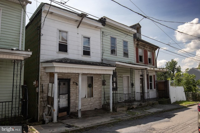 view of property with a porch