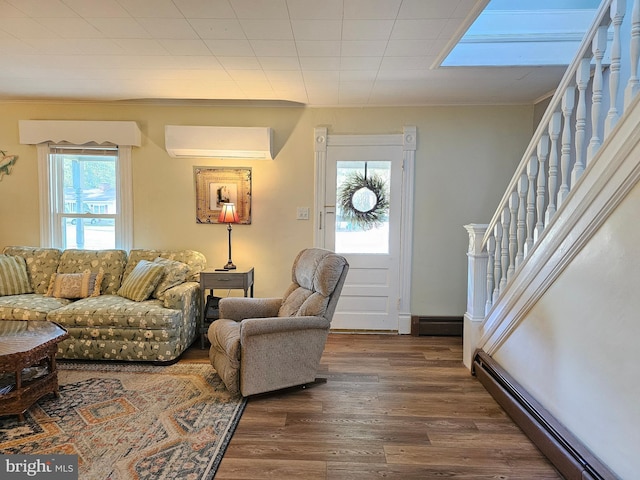 living room featuring a wall unit AC, a baseboard radiator, and dark hardwood / wood-style flooring