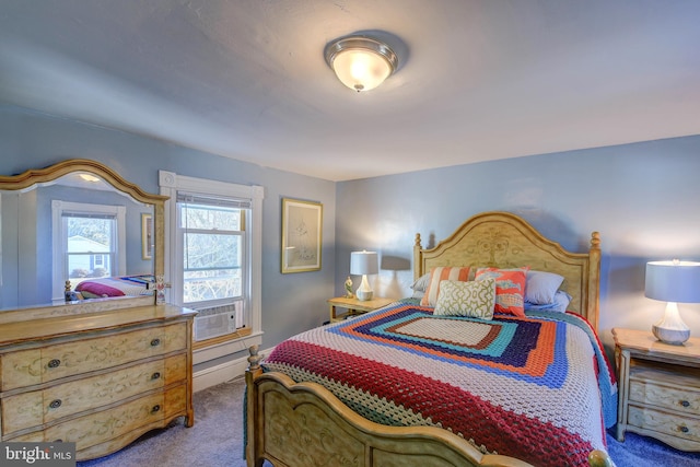 bedroom featuring cooling unit and carpet