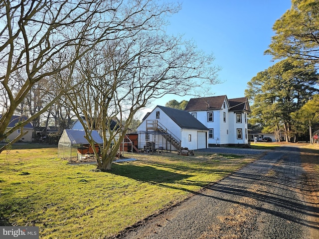 view of front of home with a front lawn