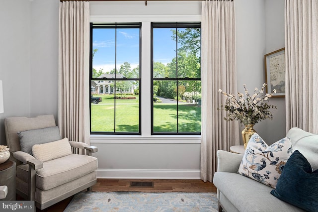 sitting room featuring hardwood / wood-style flooring