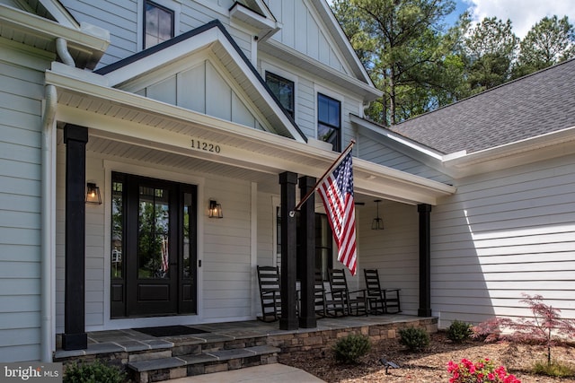 property entrance featuring covered porch