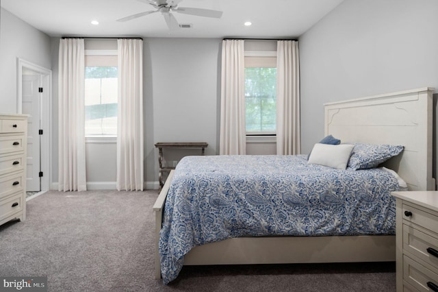 carpeted bedroom with ceiling fan