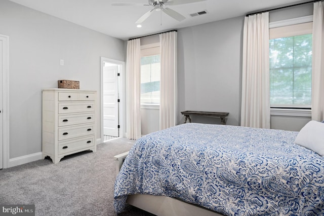 carpeted bedroom with ceiling fan