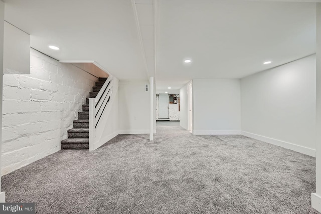 basement featuring carpet flooring