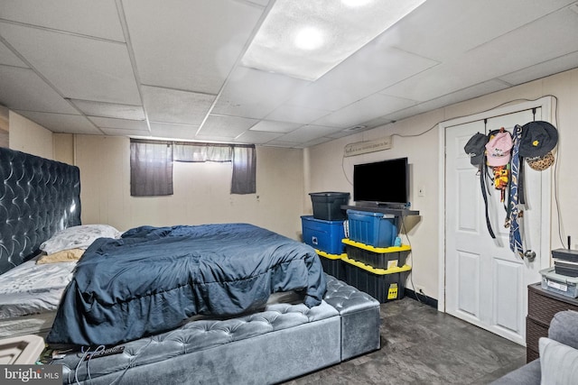 bedroom with a paneled ceiling