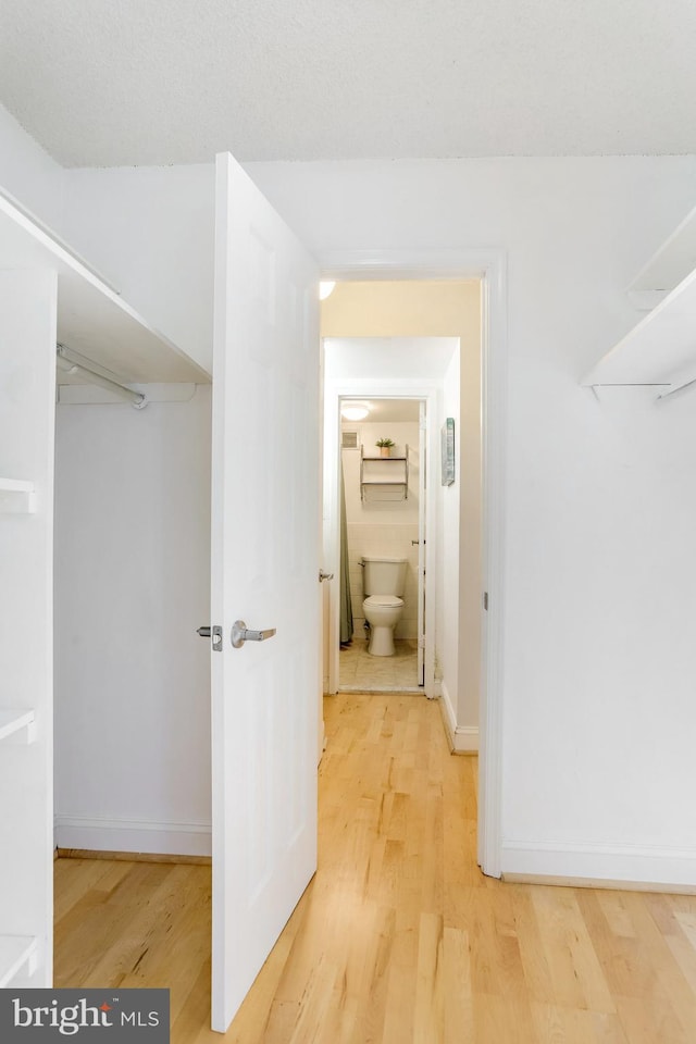 hall featuring hardwood / wood-style floors