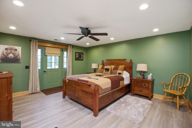 bedroom featuring ceiling fan and light hardwood / wood-style floors