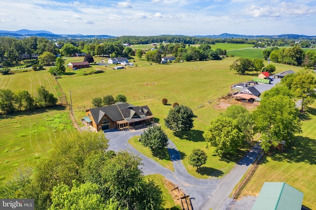 aerial view featuring a mountain view and a rural view