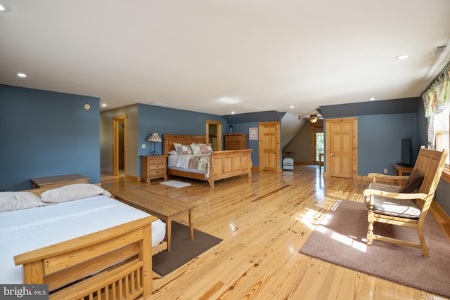 bedroom featuring visible vents, light wood-style flooring, recessed lighting, and baseboards