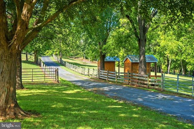 view of stable featuring a rural view