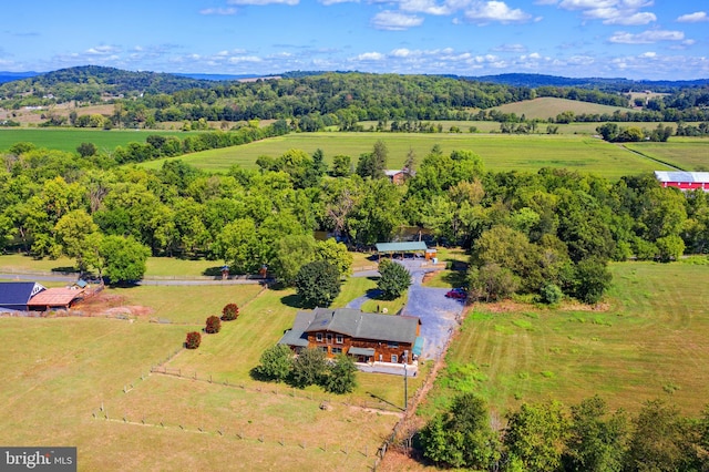 birds eye view of property featuring a rural view