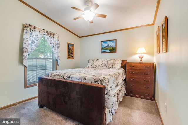 carpeted bedroom with ceiling fan and crown molding