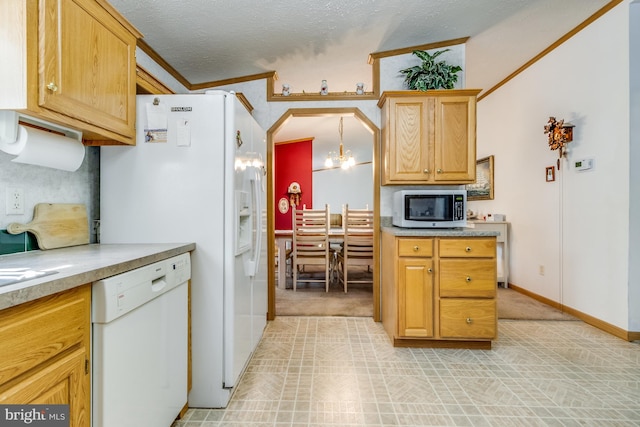 kitchen featuring dishwasher, ornamental molding, an inviting chandelier, a textured ceiling, and light tile patterned flooring