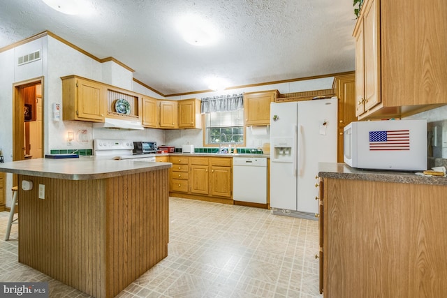 kitchen featuring lofted ceiling, white appliances, a breakfast bar, ornamental molding, and a textured ceiling