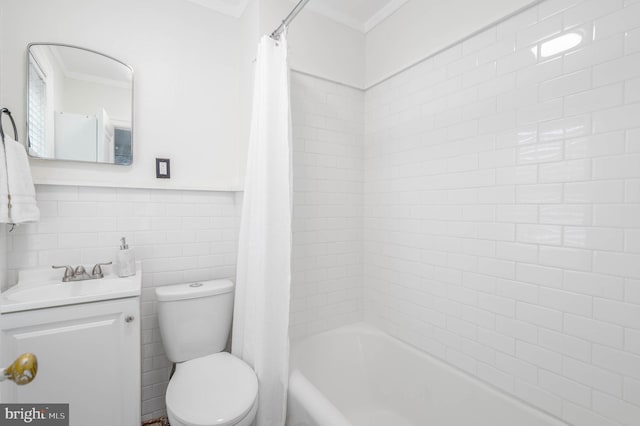 full bathroom with vanity, tile walls, shower / bathtub combination with curtain, and toilet