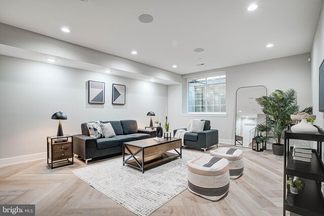 living room featuring light parquet flooring