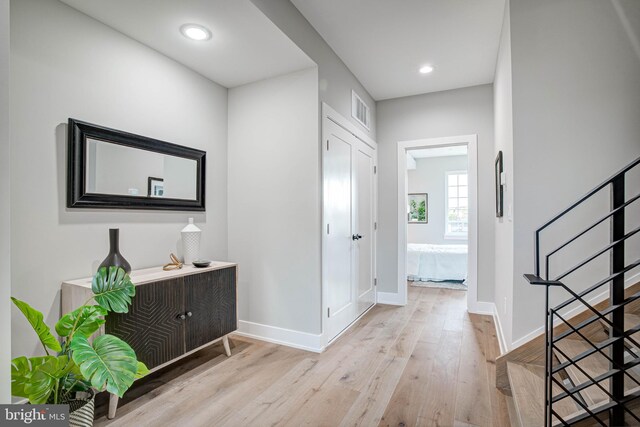 foyer with light wood-type flooring