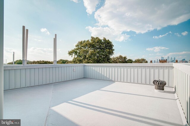 view of patio with a balcony