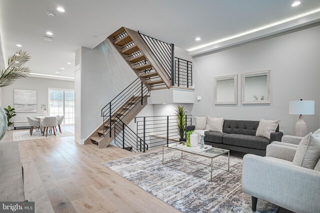 living room with light hardwood / wood-style floors