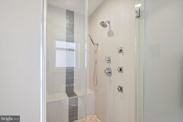 bathroom with an enclosed shower