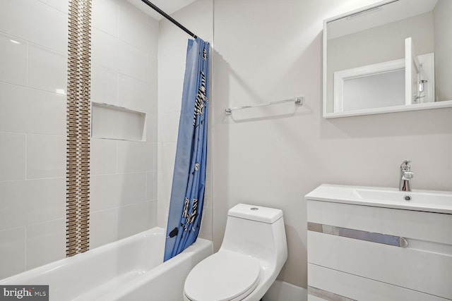 full bathroom featuring vanity, toilet, and shower / bath combo with shower curtain