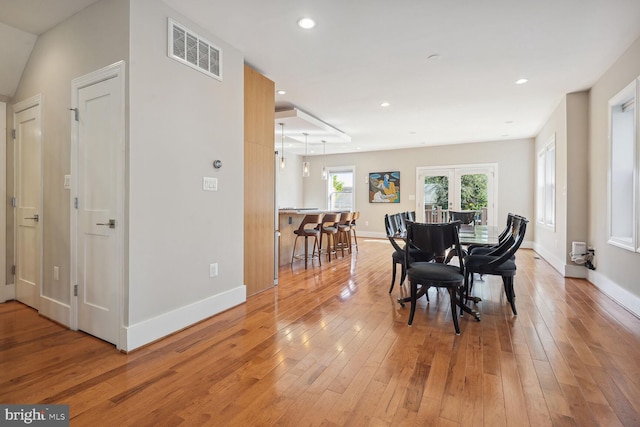 dining room with light hardwood / wood-style floors