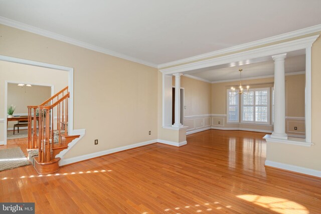 dining room with hardwood / wood-style floors, ceiling fan, and crown molding