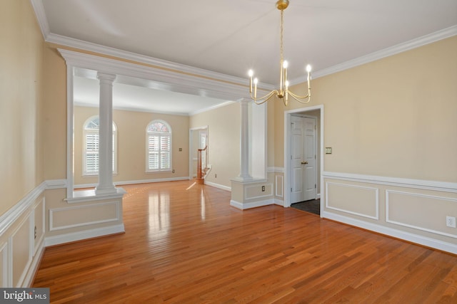 kitchen with sink, crown molding, dark tile patterned floors, and stainless steel appliances