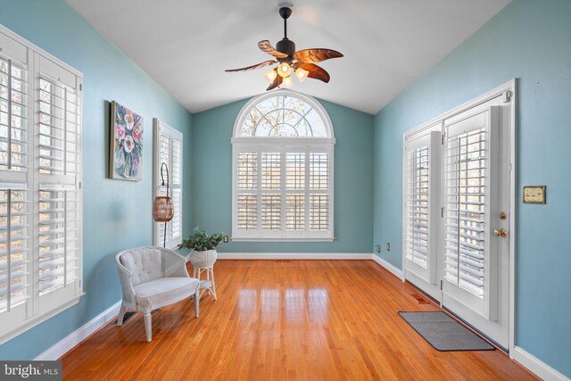 dining area featuring light wood-type flooring, ornamental molding, and a chandelier