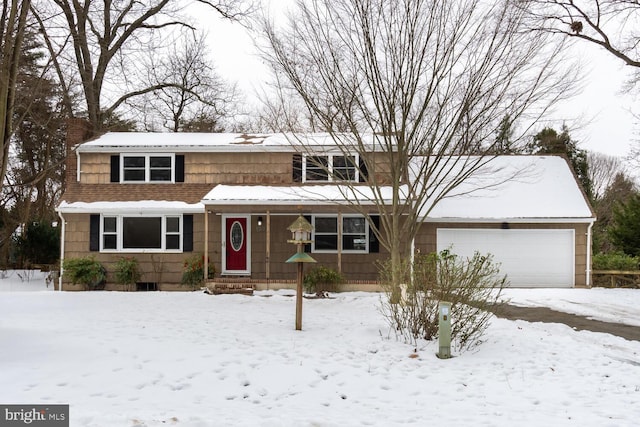 front of property with a garage