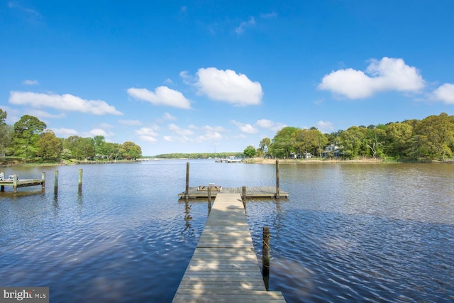 view of dock with a water view