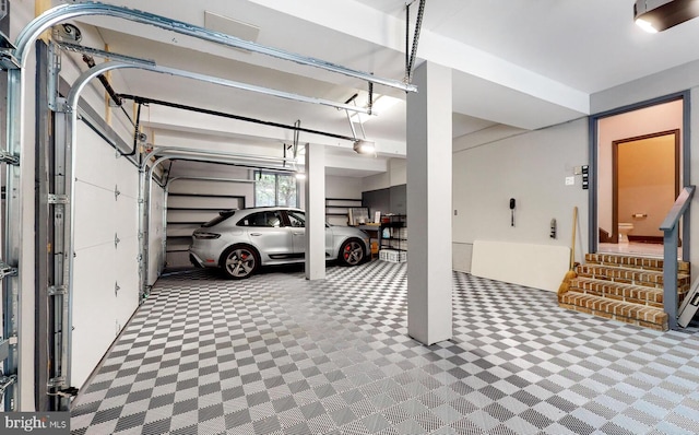 garage featuring a garage door opener