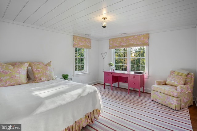 bedroom featuring hardwood / wood-style flooring