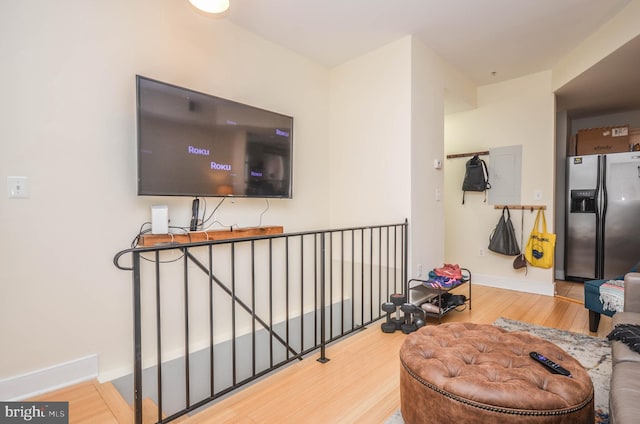 sitting room with hardwood / wood-style floors